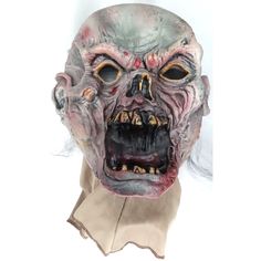 This vintage Halloween mask from Easter Unlimited features a Crypt Keeper hooded mask in a striking gray and red color. The mask is made of rubber and was manufactured in China during the 1980s. It is perfect for Halloween occasions and adds a spooky touch to any costume. The mask cannot be personalized and is not handmade. It is a great addition to any collection of holiday and seasonal collectibles. Halloween  Tales Of The Crypt Crypt Keeper  Hooded Mask Easter Unlimited   Vintage Trick Or Tre Halloween Trail Ideas, Filipino Folklore, Scary Halloween Mask, Halloween Costumes For Children, Famous Rappers, Masks Scary, Diy Halloween Masks, Best Halloween Decorations, Pumpkin Aesthetic