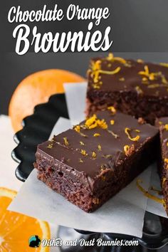 chocolate orange brownies are cut into squares and stacked on top of each other