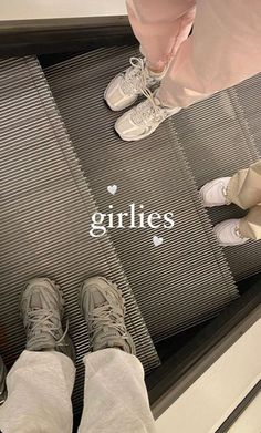 two people standing on an escalator with the words grilles written in white