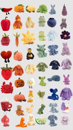 many different stuffed animals are arranged in rows