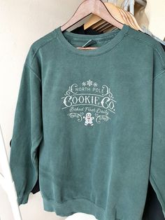 Each Sweatshirt is embroidered with a stabiliser that will soften with every wash Comfort Colors 🌿9.5 oz., 80/20 ring spun cotton/polyester 🌿 3-end garment-dyed ringspun fleece 🌿 Relaxed fit 🌿 Double-needle 1x1 rib collar 🌿 Twill taped back neck for extra durability 🌿 Double-needle neck, shoulder, armhole, cuffs and waistband 🌿 Rolled-forward shoulder 🌿 Back neck patch 🌿 Side seams 🌿 Signature twill label These are adult unisex Comfort Colors sweatshirts (80% cotton / 20% polyester). D Holiday Sweatshirts, Colorful Wardrobe, Comfort Colors Sweatshirt, Holiday Sweatshirt, Sweatshirt Vintage, Sweatshirt Christmas, Embroidered Sweatshirt, Winter Aesthetic, Vintage Holiday