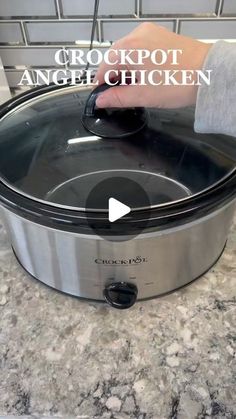 the crock pot is being used to cook chicken