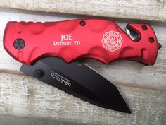 a red firefighter's knife with the name joe detroit id on it