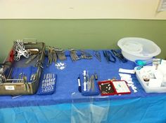 the table is covered with many medical items