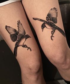 two birds on legs with black ink