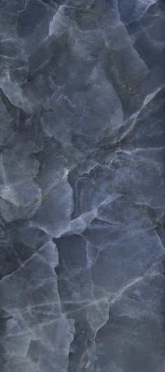 the surface of an ice - covered mountain is very dark