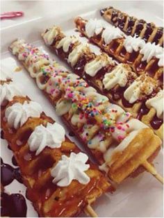 several different types of waffles with toppings on them