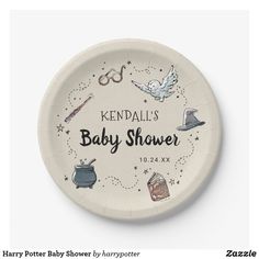 a paper plate with an image of baby shower items on the front, and words that read kendall's baby shower