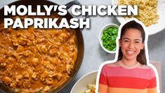 a woman standing in front of a pan filled with pasta and chicken paprikash