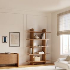 a living room filled with furniture and a window