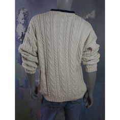 This 1990s off-white cotton cable knit sweater has a navy blue edge at its round neckline. The handsome pullover has 1.5-inch (3.81cm) ribbed cuffs and a 2-inch (5.08cm) ribbed waistband. Brand label: L.O.G.G., Label of Graded Goods Size: XXL (46 to 48 US/UK) Material: Cotton Condition: Excellent (Professionally Cleaned ... soft and supple, with no stains, tears, wear spots, or weaknesses in the seams) --- M E A S U R E M E N T S --- Chest = 50 inches (127cm) (meant to fit loosely; best fit for Classic Cotton Cable Knit Polo Sweater, Classic Cotton Cable Knit Sweater, Beige Cotton Cable Knit Sweater, Cotton Cable Knit Sweater, White Cable Knit Sweater, Long Overcoat, Trench Coat Black, Brand Label, European Vintage