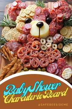 A baby shower charcuterie board arranged in the shape of a teddy bear, featuring cheeses, salami, olives, and crackers with a cozy, savory look. *We may earn a small commission from your purchase. Teddy Bear Appetizers, Teddy Bear Veggie Tray, Teddy Bear Charcuterie Board, Bear Fruit Tray, Pregnancy Charcuterie Board, Teddy Graham Snack Ideas, Bear Themed Baby Shower Food, Bear Charcuterie Board, Charcuterie Board Baby Shower Ideas