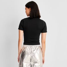 This Seamless Jersey Crop Top from A New Day™ in a solid colors offers easy pairing with a range of looks. Fashioned in a cropped length, it features a classic crewneck and a slim silhouette to give you a fitted look. The lightweight fabric with added stretch and a seamless design offers a more comfortable fit, and you can wear it with your choice of bottoms to create a range of versatile styles. . A New Day™: Style that goes wherever you do. Basic Solid Seamless Tops, Basic Seamless Solid Tops, Trendy Solid Snug Fit Tops, Trendy Snug Fit Solid Top, Trendy Snug Fit Solid Color Tops, Basic Plain Crop Top, Basic Solid Cropped T-shirt With Ribbed Detail, Fitted Cropped Top, Trendy Cropped Seamless T-shirt