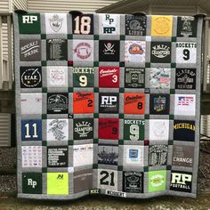 a quilt made to look like it has many different patches and numbers on it,