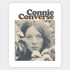 an old comic book cover with a woman's face surrounded by flowers