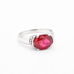 Boho Ruby Ring set with Created Ruby in a perfect diamond cut & stunning red color, at 10x8mm (3 Cts).Solid 925 Sterling Silver ☞ made to last.Click here for ☞ Matching EarringsMatching Pendant - please ask meDetails:• Created Ruby in flawless clarity• Ruby: 10x8mm, 3 Cts, diamond cut• Dimensions: Band width ≈ 3mm, thickness ≈ 1.2mm• Solid 925 Sterling Silver SKU 2183 Red Oval Birthstone Ring With Prong Setting, Classic Red Oval Diamond Ring, Elegant Red Sterling Silver Ring, Classic Red Gemstone Crystal Ring, Classic Oval Red Birthstone Ring, Classic Red Oval Birthstone Ring, Lab-created Ruby Ring With Diamond Accents As Gift, Lab-created Ruby Rings With Diamond Accents For Gift, Gift Ring With Diamond Accents And Lab-created Ruby