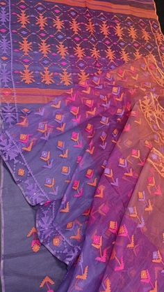 This Exclusive Handwoven Handloom Authentic Original Jamdani Saree is from Dhaka, Bangladesh. This beautiful Saree is crafted with 84 Counts with thread Woven. Exclusive partywear Saree with Unstitched Blouse Piece. The Saree is beautiful and the finest quality. Beautiful Pallu with Tassels. Lightweight and Fall & Pico Done Transitional Purple Embroidered Dupatta, Transitional Embroidered Purple Dupatta, Purple Chanderi Handloom Blouse Piece, Traditional Embroidered Purple Saree, Purple Embroidered Fabric For Festivals, Multicolor Embroidered Fabric With Pallu For Transitional Season, Traditional Multicolor Blouse Piece With Cutdana, Purple Chanderi Embroidered Fabric For Festivals, Bollywood Style Multicolor Handloom Dupatta