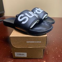 Superdry Mf3108st Classic Pool Slide Sandals Sz S Brand: Superdry Department: Men Size: Small Color: Black, White Type: Sandals Style: Slide Style Code: Mf3108st Pattern: Solid Theme: Classic Closure: Slip On Features: Comfort, Lightweight Occasion: Casual Seasons: All Seasons Condition: New With Box I Offer Discounts For All Return Customers. - Jvs Black Waterproof Slides For The Beach, Black Non-slip Sport Sandals For Streetwear, Black Waterproof Slides For Summer, Black Flat Slides For Outdoor, Black Round Toe Slides For Outdoor, Black Slip-resistant Slide Sport Sandals, Black Slip-resistant Sport Sandals With Round Toe, Black Waterproof Open Toe Sandals, Black Open Toe Waterproof Sandals