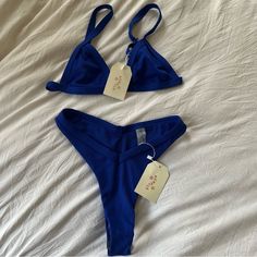 Royal Blue Aurelle Bikini Size Small Blue Stretch Swimwear With Bra Friendly Feature, Blue Stretch Swimwear With Bra Friendly Design, Blue Stretch Swimwear With Bra-friendly Design, Blue Bra-friendly Swimwear For Poolside, Blue Bra-friendly Swimwear For Beach Party, Blue Triangle Top Swimwear Bra Friendly, Fitted Seamless Blue Swimwear, Fitted Blue Swimwear, Bra Friendly, Bra Friendly Blue Summer Swimwear