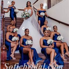 the bride and her bridal party pose on the stairs