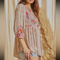 Savana Jane Embroidered Top Embroidery On Front And Sleeves True To Size Festive Bohemian Floral Embroidered Top, Multicolor Embroidered Folk Fabric, Bohemian Embroidered Top With Floral Design For Festive Occasions, Beige Embroidered Bohemian Top, Bohemian Floral Embroidered Top For Festive Occasions, Bohemian Embroidered Top For Festive Occasion, Beige Bohemian Embroidered Top, Spring Embroidered Top With Geometric Multicolor Embroidery, Spring Festive Embroidered Top With Floral Print