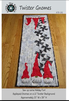 a quilted table runner with two gnomes on it and the words twister gnomes