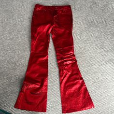 Never Worn So Cool On Sold Out Online Fitted Pants For Christmas Party, Red Flare Bottoms For Party, Red Flare Party Bottoms, Red Flare Pants For Party, Fitted Red Bottoms For Holiday, Festive Fitted Red Pants, Fitted Red Bottoms For Festive Occasions, Festive Fitted Red Bottoms, Red Full Length Pants For Party