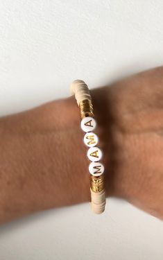 "Orders will be shipped next week and can not be ready for Mother s day. Custom Heishi bracelets are beautiful gift for everybody. 6 mm. Heishi beads in different colors, brushed gold plated discs and custom name will be used or you can prefer no name. Gold plated plain bracelet looks very chic. ❣️To know your size please measure your wrist with a ribbon/string and measure this with a ruler. Add 0.25\". Size:6.25\" - 6.5\" - 6.75\" - 7\" - 7.5\" - 8\" Kid size is available such as 5.5\" and you Gold Heishi Beads Name Bracelet As Gift, Customizable Gold Beaded Bracelets, Personalized Gold Heishi Beads Stretch Bracelet, Personalized Gold Heishi Beads Bracelets, Plain Bracelet, Heishi Bracelets, Heishi Bracelet, Kids Bracelets, Heishi Beads