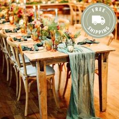 the table is set with green napkins and place settings