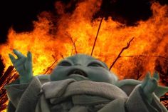 the statue of liberty is in front of a fire with its hands up and eyes wide open