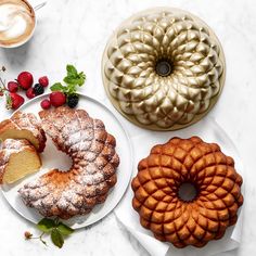 three different types of cakes and pastries on plates