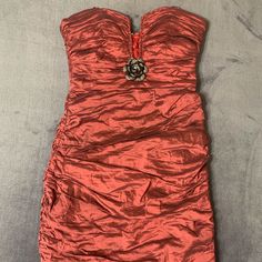 -Ruby Red -Strapless -Ruched -Cocktail Mini Dress -Size 6 -Fitted -Plunging Neckline That Leads To Beautiful Rose Metal Pendant. New Without Tags, Never Worn, Smoke Free, Pet Free Home. Cocktail Strapless Dress With Ruched Bodice, Red Strapless Dress With Fitted Bodice, Fitted Ruched Strapless Dress For Dinner, Red Strapless Dress With Ruched Bodice For Cocktail, Red Strapless Dress With Ruched Bodice For Party, Red Mini Dress With Ruched Bodice For Evening, Red Strapless Dress With Sweetheart Neckline For Formal Events, Red Strapless Mini Dress With Ruched Bodice, Red Fitted Strapless Evening Dress