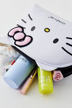 a hello kitty bag with various items in it