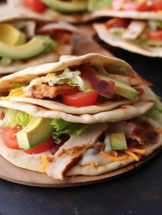 several tortillas are stacked on top of each other