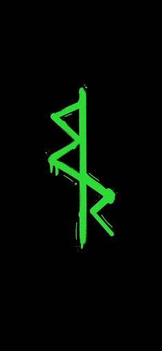 the green arrow symbol is painted on a black background