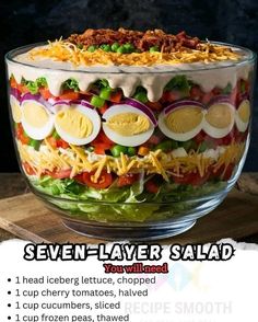 an image of a layered salad with eggs and cheese