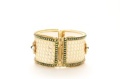 Description: Glorify your beautiful hands with these white plated Bracelet with polki work.Excellently crafted, these bangles are polished with gold that makes them more lustrous.This piece of jewelry comes with the assurance of quality and durability. Type: Bracelet Base material: AlloyPlating: WhiteColor: White and GreenWork: PolkiLook: DesignerOccasion: PartyWidth 1Care Keep It Away From PerfumeFinish Glossy Openable Bangle with Screw Photo may have been enlarged and/or enhanced. please allow White Kundan Bracelets With Meenakari, White Kundan Bracelet, White Kundan Bracelets With Cutdana, White Kundan Cutdana Bracelets, White Kundan Bracelet With Stone Work, White Kundan Temple Jewelry Bracelets, White Bollywood Bracelets With Intricate Design, White Kundan Bollywood Bracelets, Festive White Kundan Bracelets