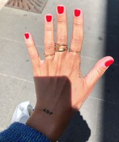 Red gel nail polish on hand with several rings and a small tattoo that says ‘JOY’ Nails Squoval, Nails Rings, Nail Tattoo, Design Minimalist, Bling Nails, Nails Inspo