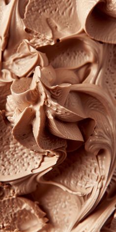 a close up view of some chocolate frosting