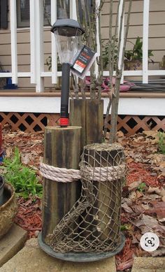 there is a tree that has been made out of wood and some kind of wire