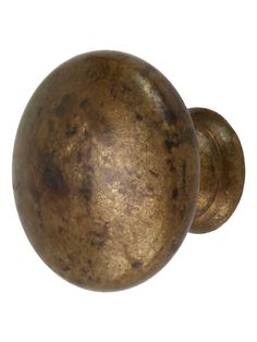 an antique brass door knob on a white background