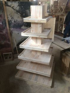 several wooden shelves stacked on top of each other