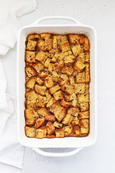 a casserole dish filled with gluten - free french toast casserole