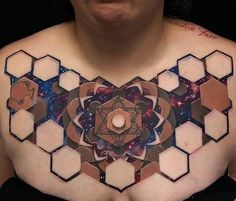 a man's chest with an abstract design on it