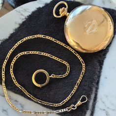 Antique Solid 14k Yellow Gold Pocket Watch with 19" 14k Watch Chain SPECTACULAR!! Amazing Old Gold 14k 585 Pocket Watch!! Comes on a 14k yellow gold watch chain. I don't believe chain is from the 1920's, I believe it was added later on with second owner (1980's) Watch case measures approximately 50mm across. Chain is just under 19" end to end. Total weight with chain 87.2 grams! I am not sure of the exact year of this watch, two different dates engraved inside front cover oldest date 1928 approx Classic Yellow Gold Round Jewelry And Watches, Victorian Yellow Gold Pocket Watch For Anniversary, Timeless Yellow Gold Jewelry And Watches, Polished Finish, Heirloom Engraved Yellow Gold Pocket Watch, Elegant Engraved Yellow Gold Pocket Watch, Elegant Yellow Gold Pocket Watch For Formal Events, Elegant Yellow Gold Pocket Watch For Formal Occasions, Heirloom Yellow Gold Jewelry, Timeless Polished Yellow Gold Jewelry