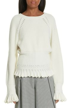 For Sale 100% Authentic NEW Opening Ceremony Pointelle Detail Ruffle Trim Sweater in Ivory -Size L  Details Color: Ivory  Size:� L Underarm:20.5" across closed Hem: 20" Length from shoulder: 25.5" Sleeves: 28.5" Details & Care Panels of dainty pointelle stitching and ultra-wide ribbing detail a cozy sweater before flaring out into fluttery ruffles at the edges. Crewneck Long sleeves 62% viscose, 38% polyester Hand wash, dry flat Imported Shipping and returns Combine shipping is available, please Eyelet Sweater, Knitwear Details, Plain Sweaters, Ruffle Sweater, Crochet Clothes Patterns, Detailed Sweater, Sweaters Online, Cozy Sweater, Opening Ceremony