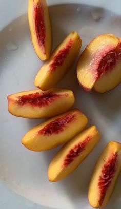 sliced peaches on a plate ready to be eaten