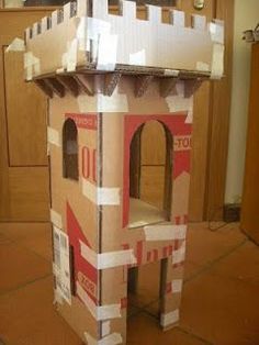 a cardboard castle made to look like it is built into the ground