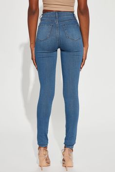 Say hi to your waist as you slip into our best-selling flexible stretch denim pants. The Classic High Waist Skinny Jeans feature a dark wash, 2 back pockets, 2 faux front pockets, a zip fly closure, and are available in Curve. Providing a seamless transition from day to night, these jeans are a wardrobe essential. Available In Multiple Washes Available in Petite 28" Inseam, Regular 31" Inseam, & Tall 34" Inseam 11" High Rise Skinny Jean High Stretch Faux Front Pockets Functional Back Pockets Dis Stretch Mid-rise Denim Jeans, Medium Wash Stretch Straight Leg Bottoms, Mid-rise Dark Wash Elastane Bottoms, Dark Wash Mid-rise Elastane Bottoms, Dark Wash High Rise Jeggings For Spring, Fitted Medium Wash Jeggings With Pockets, Stretch Denim Blue Mid-rise Bottoms, Stretch Mid-rise Bottoms With Five Pockets, Dark Wash Stretch Mid-rise Bottoms