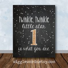 a wooden table with a sign that says twinkle, twinkle little star is what you are